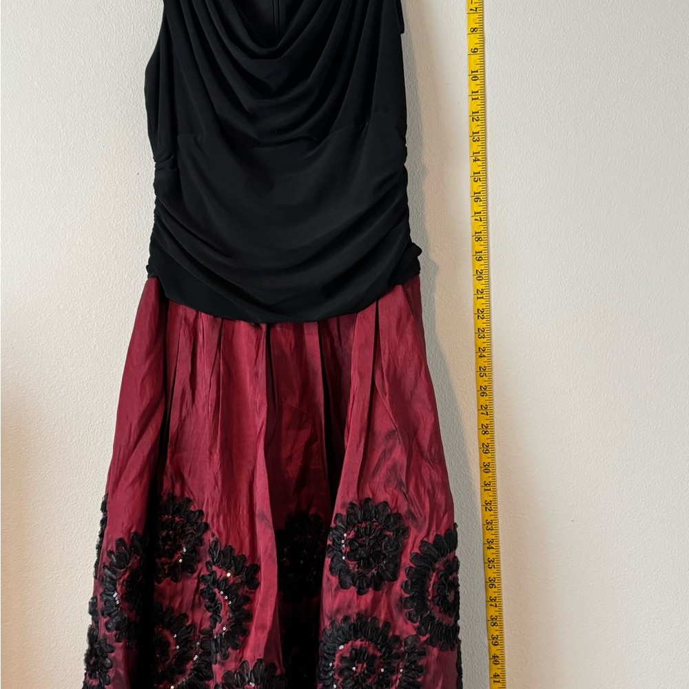 Elegant Black and Red Dress with Floral Accents
